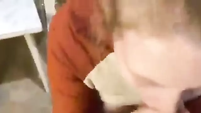 Russian student gives oral pleasure to her friend in the kitchen