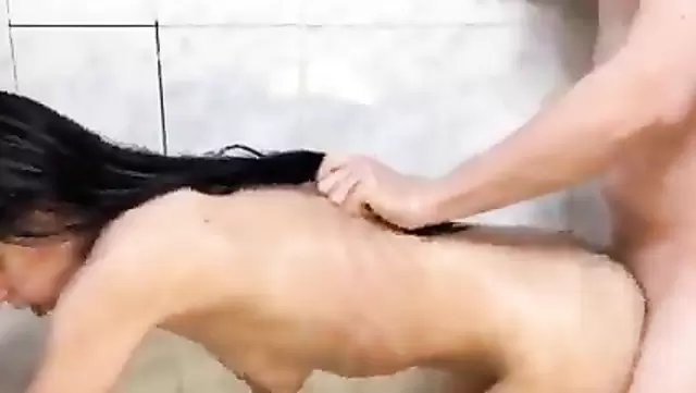 Russian brunette gets doggy style fucked in the shower